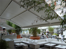 folding arm awnings for the hospitality industries, pic in colours
