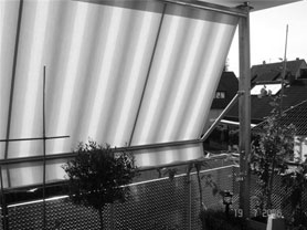 clamp awnings on a balkony, pic in b/w