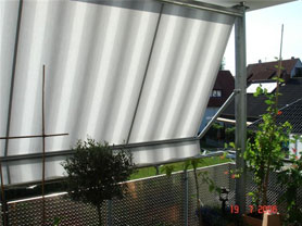 clamp awnings on a balkony, pic in colours