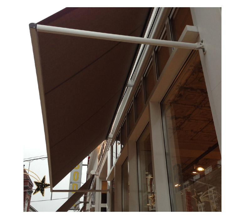 The drop-arm of a CANTO drop arm awning