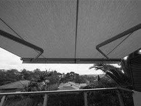 open folding arm awning, pic in b/w